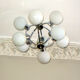 Mid century chandelier with 9 radiating milk glass globes 1970s