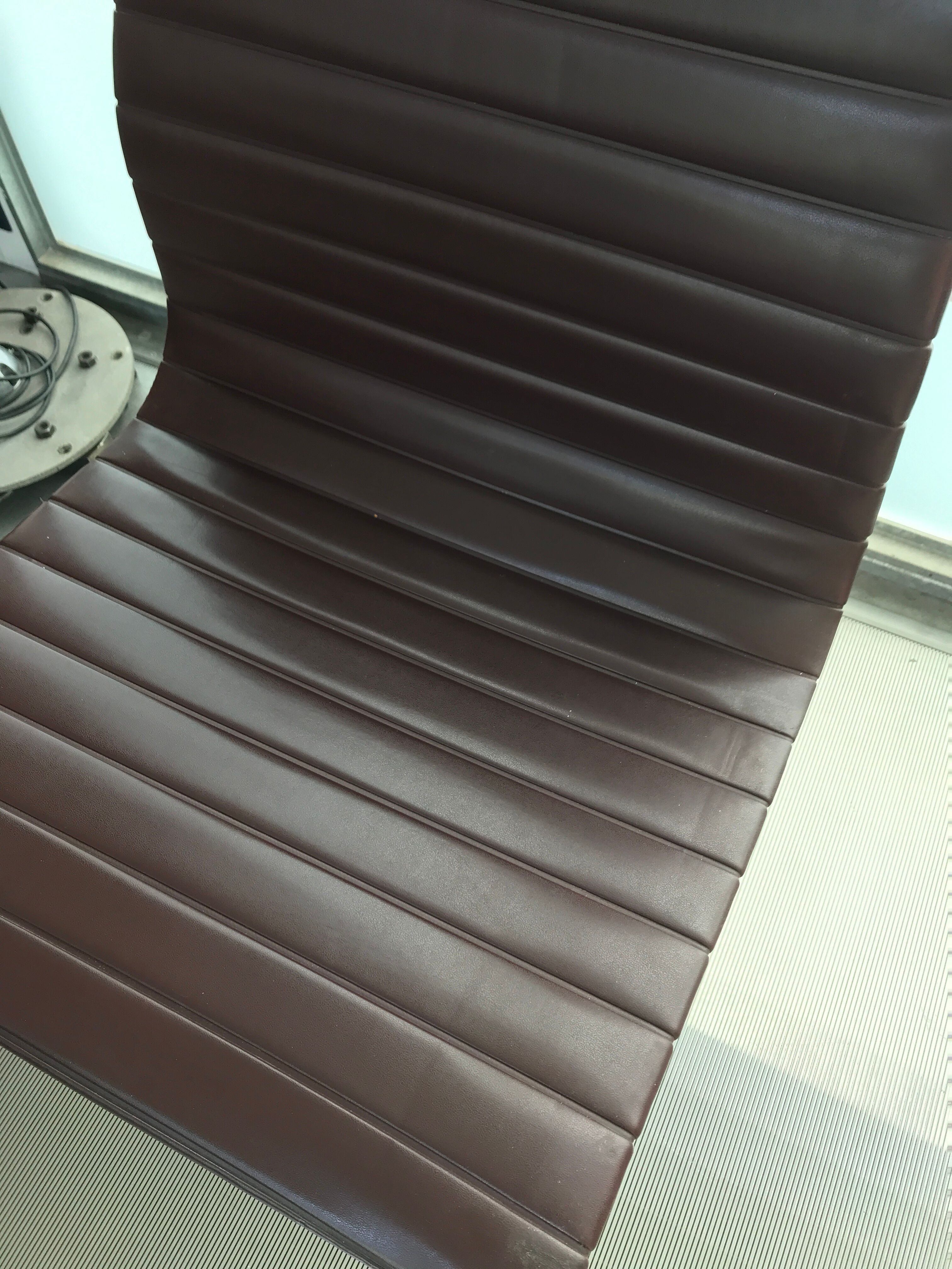 EA107 armchair by Charles and Ray Eames for Vitra