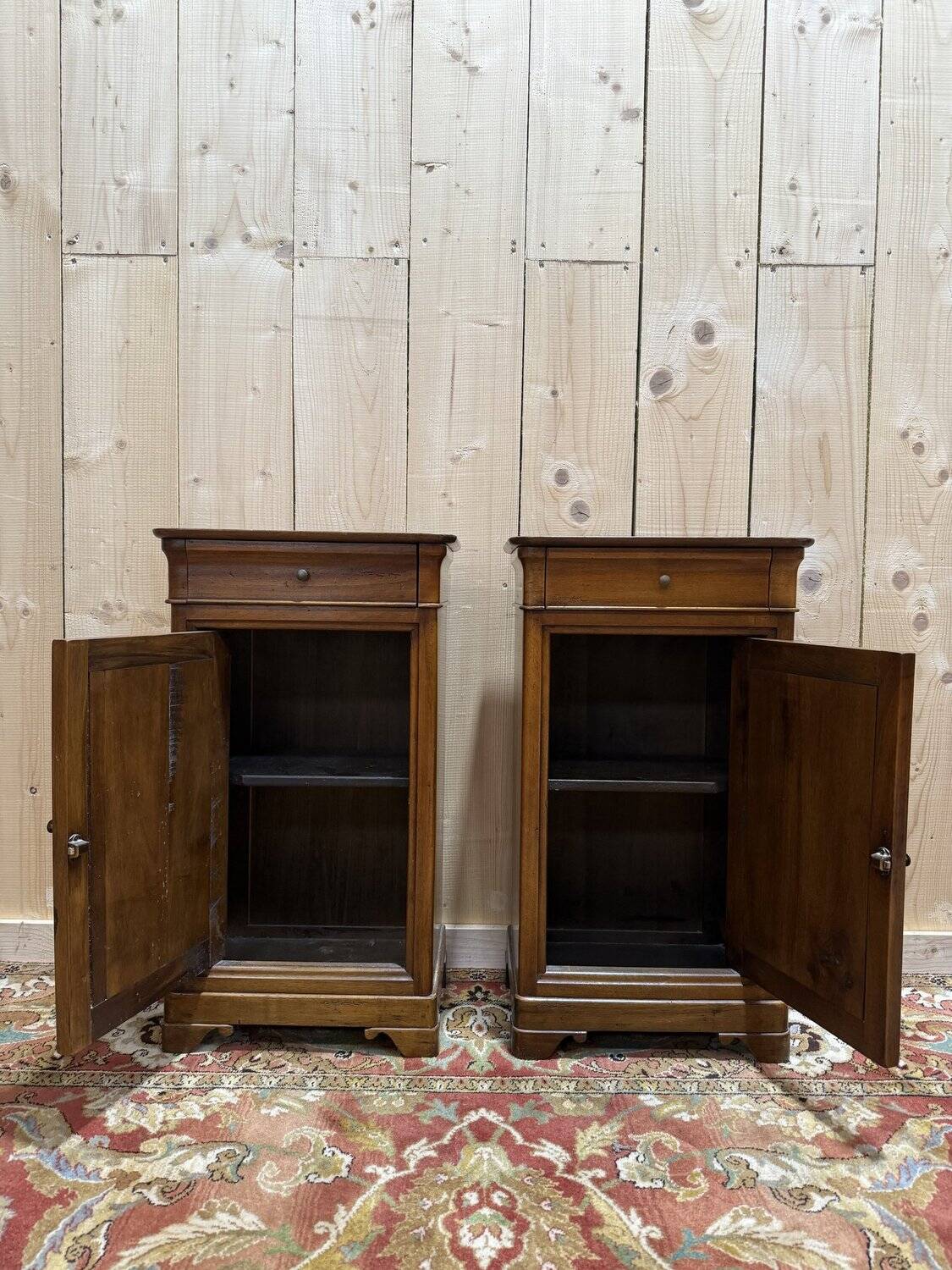 Pair of Louis Philippe style bedside tables in walnut