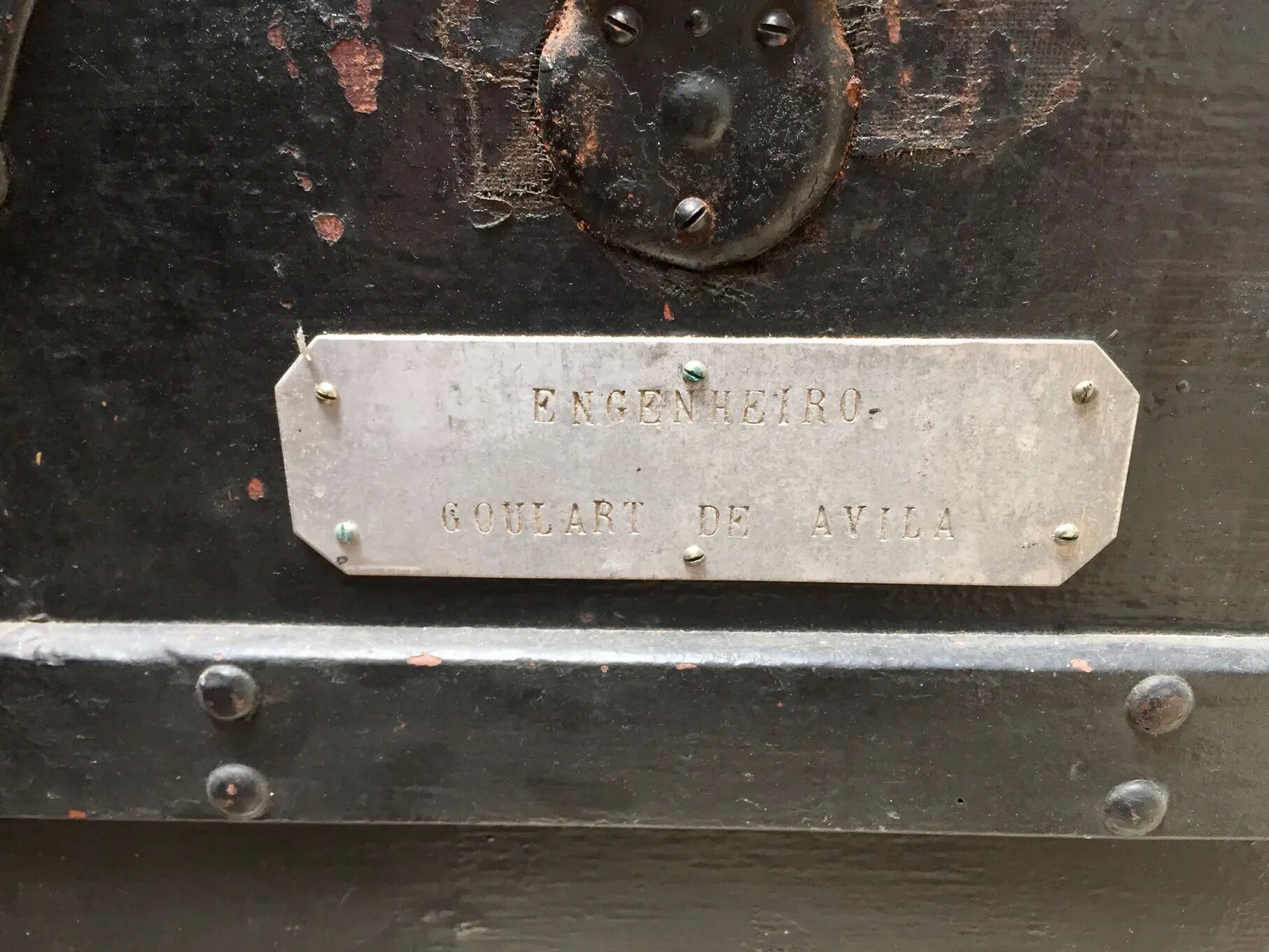 Black ancient travel trunk, 19th