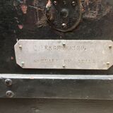 Black ancient travel trunk, 19th