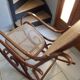 Rocking-chair in turned wood and cannage