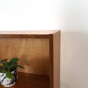 Deens teak vakkenkast met lades en hoge poten, vintage wandkast