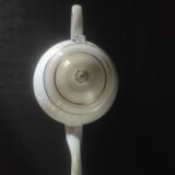 White enamelled sheet metal teapot