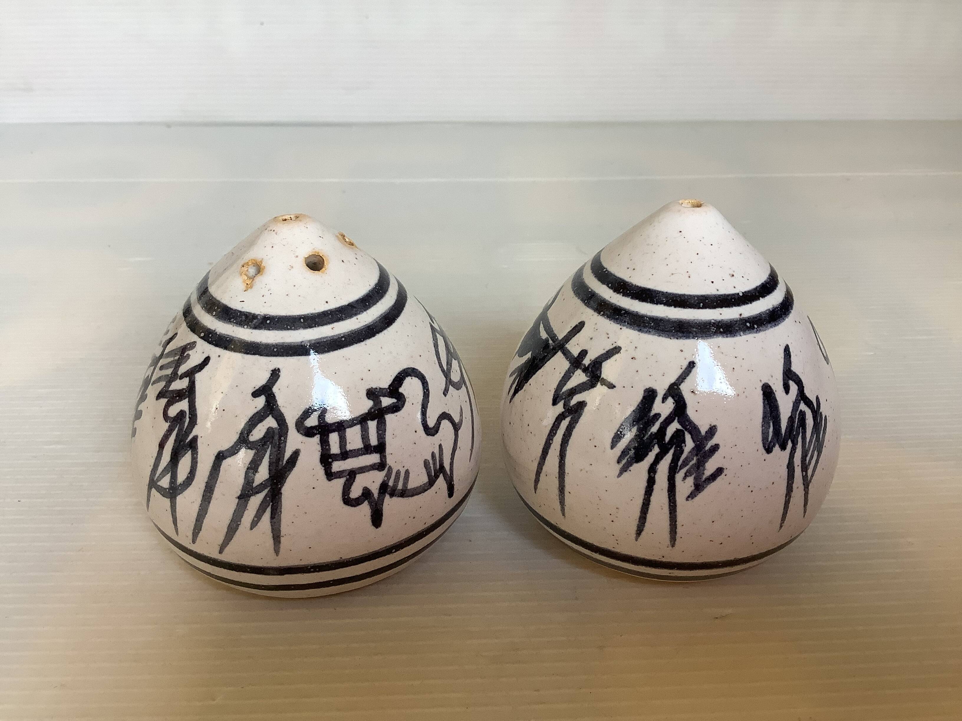 Hand-decorated ceramic salt and pepper shakers