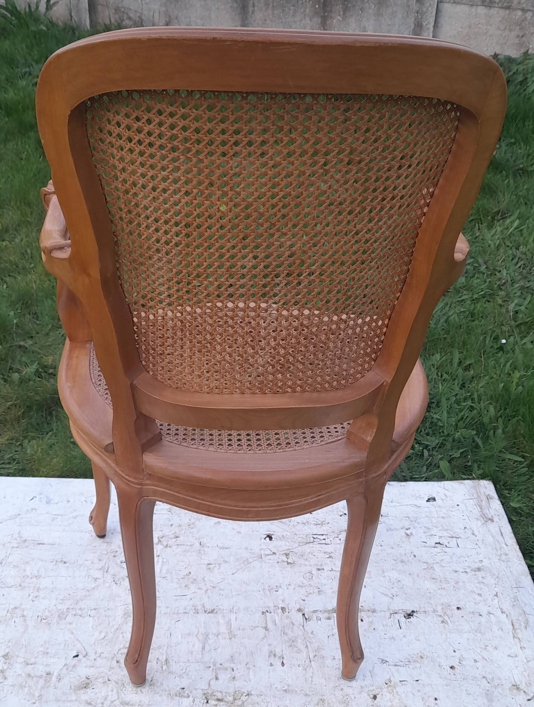 Paire de fauteuils cannés style Louis XV