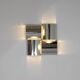 Contemporary wall light in stainless steel and metal.