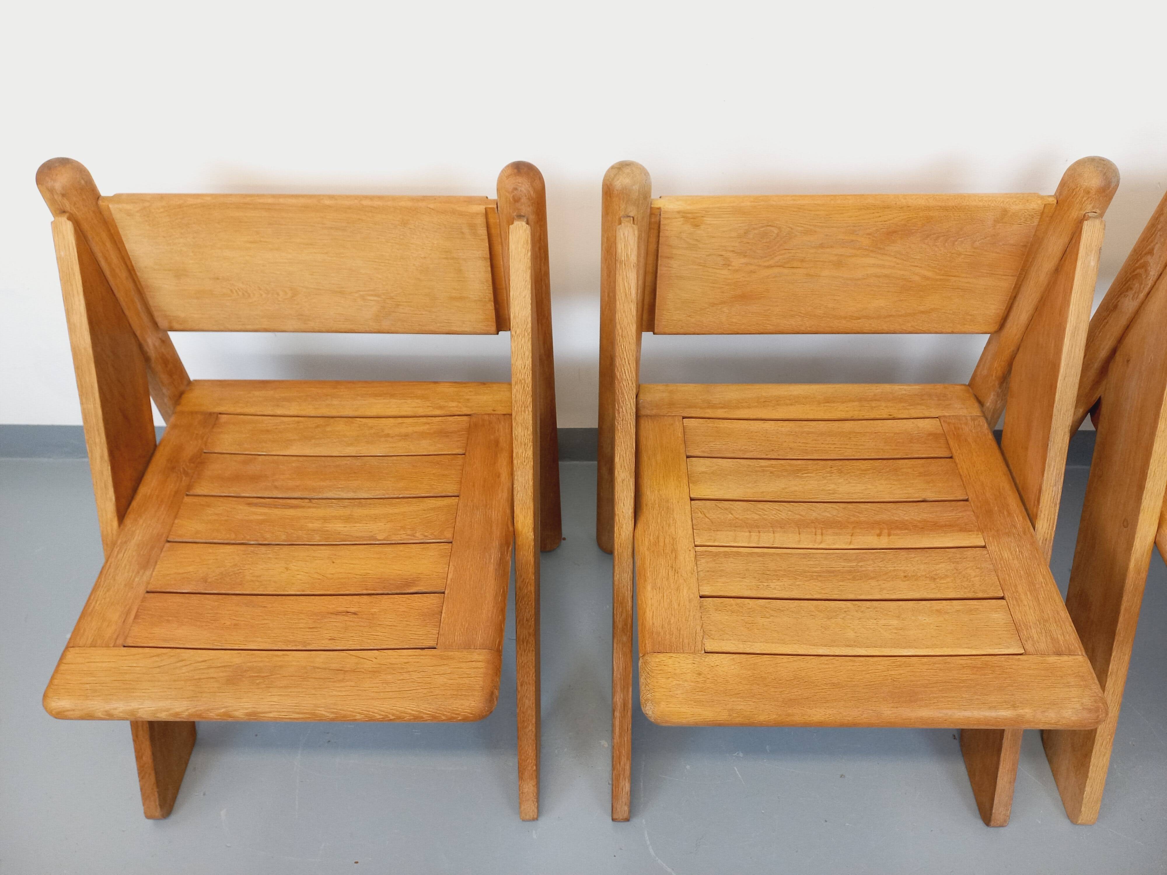 Set of 4 vintage brutalist chairs in solid oak from the 1960s.