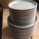 Set of 12 large and 11 small sandstone plates