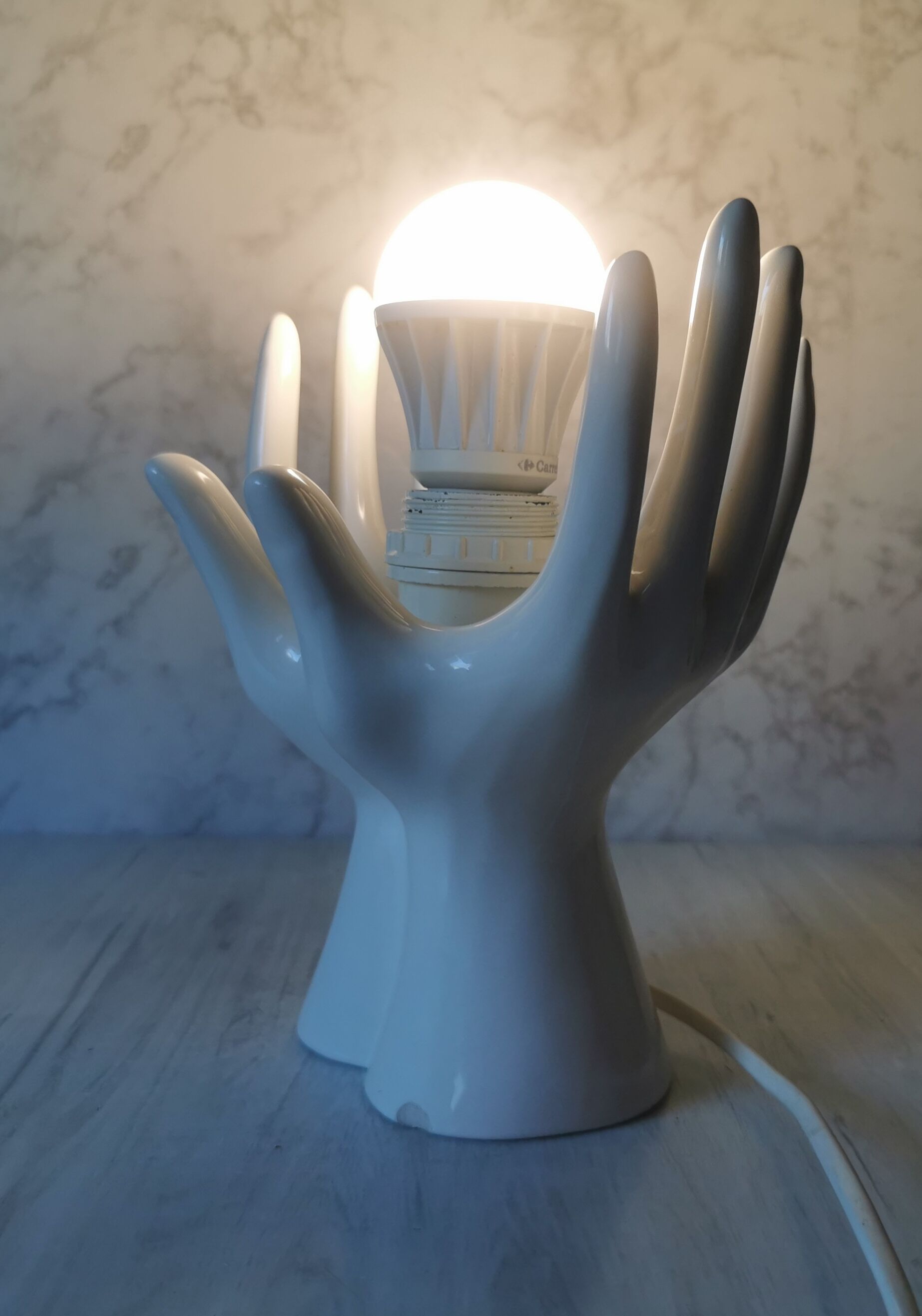 White ceramic hand lamp