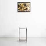 Bolster or end table in chrome steel with smoked window.