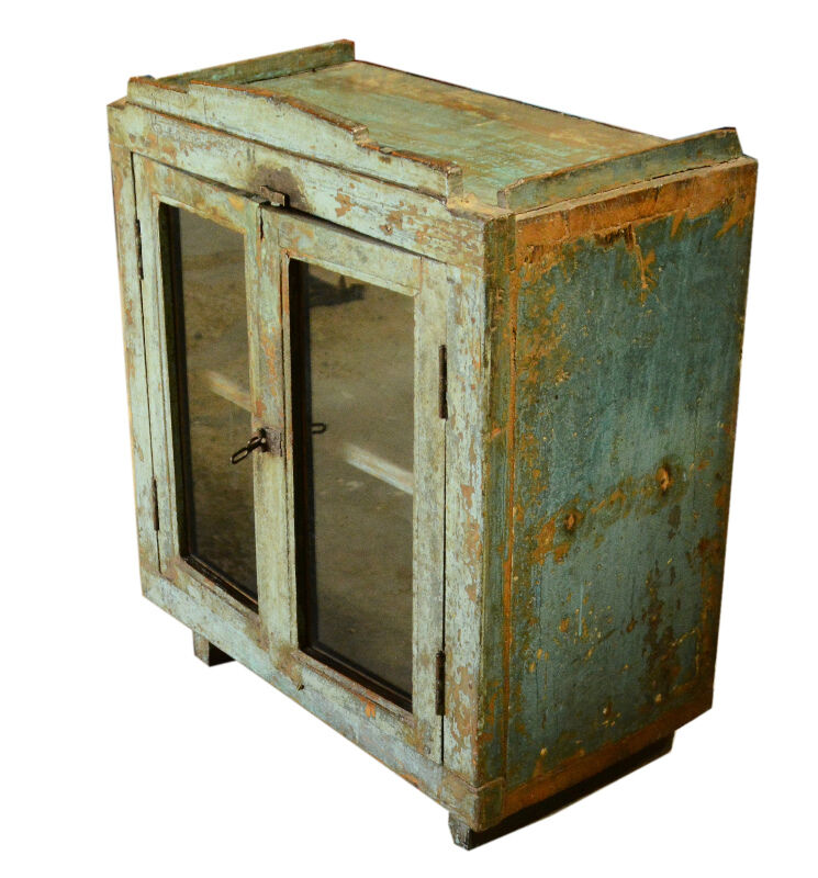 Green showcase on feet old teak wood