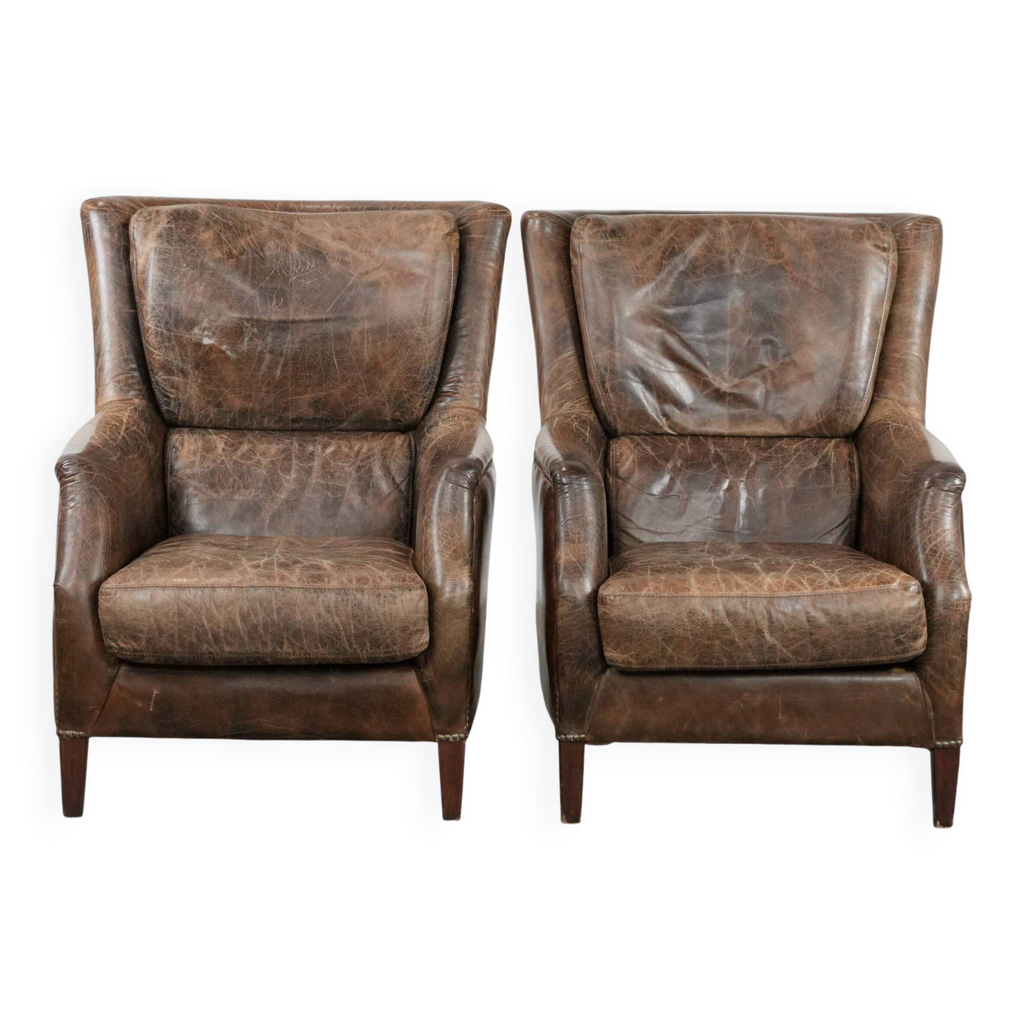 Very comfortable set of two vintage cowhide leather armchairs