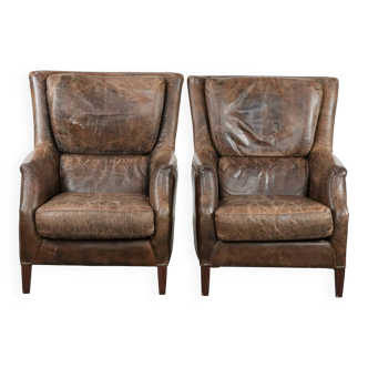 Very comfortable set of two vintage cowhide leather armchairs