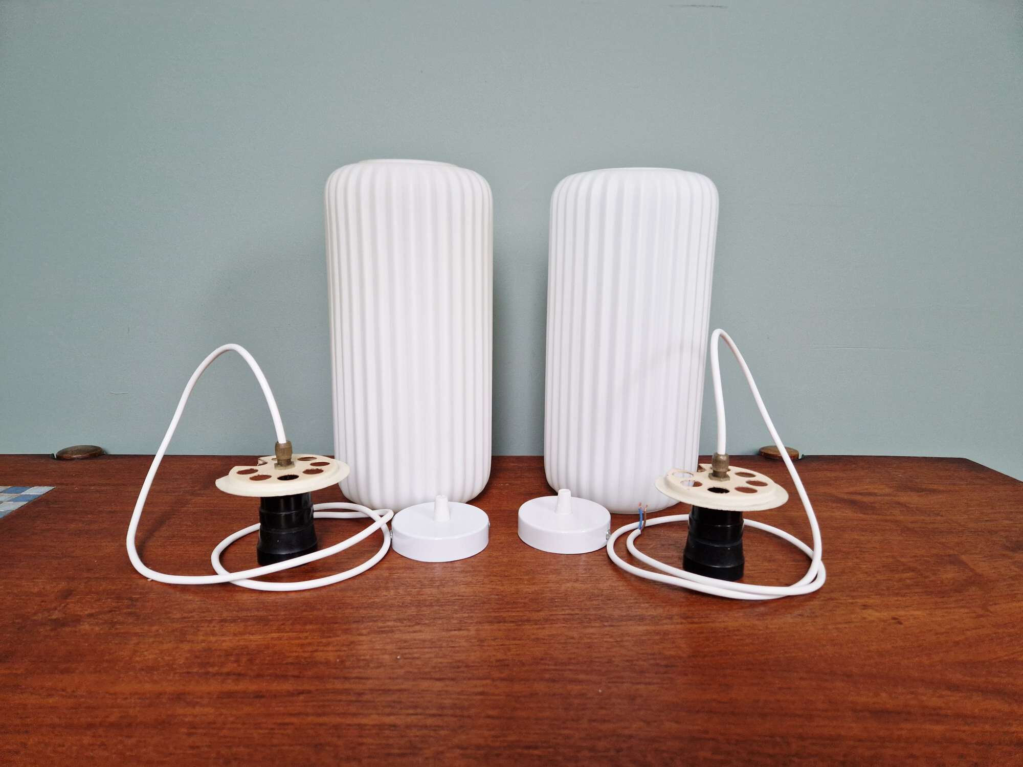 Pair of ribbed white opaline pendants, Philips, 1960s