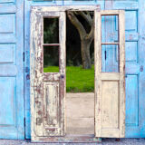 A Gorgeous Pair of Large Yellow Antique Shutter Doors