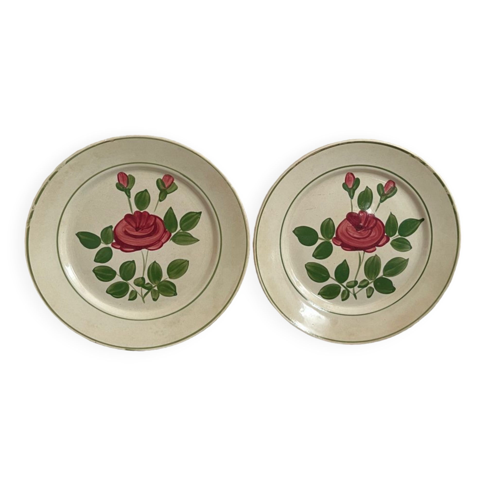 Two pink earthenware plates