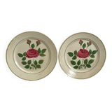 Two pink earthenware plates