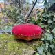 Red velvet footstool in the Louis XV style