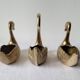 Trio of zoomorphic brass swan empty pockets