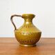 Italian pottery carafe from the mid-century by Aldo Londi for Bitossi, 1960s.