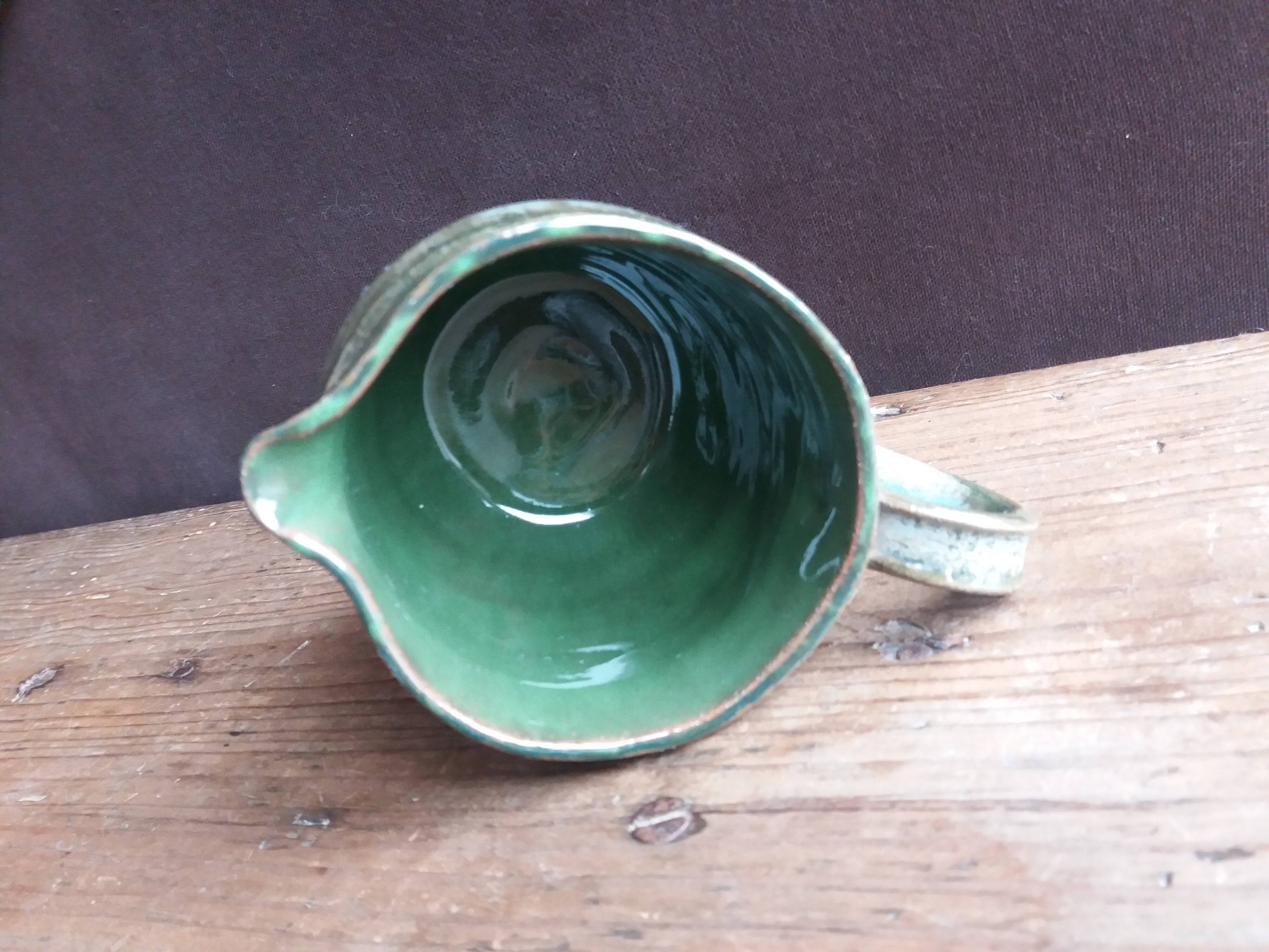 Handcrafted enameled terracotta pitcher signed