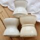 3 mismatched vintage diabolo egg cups in earthenware