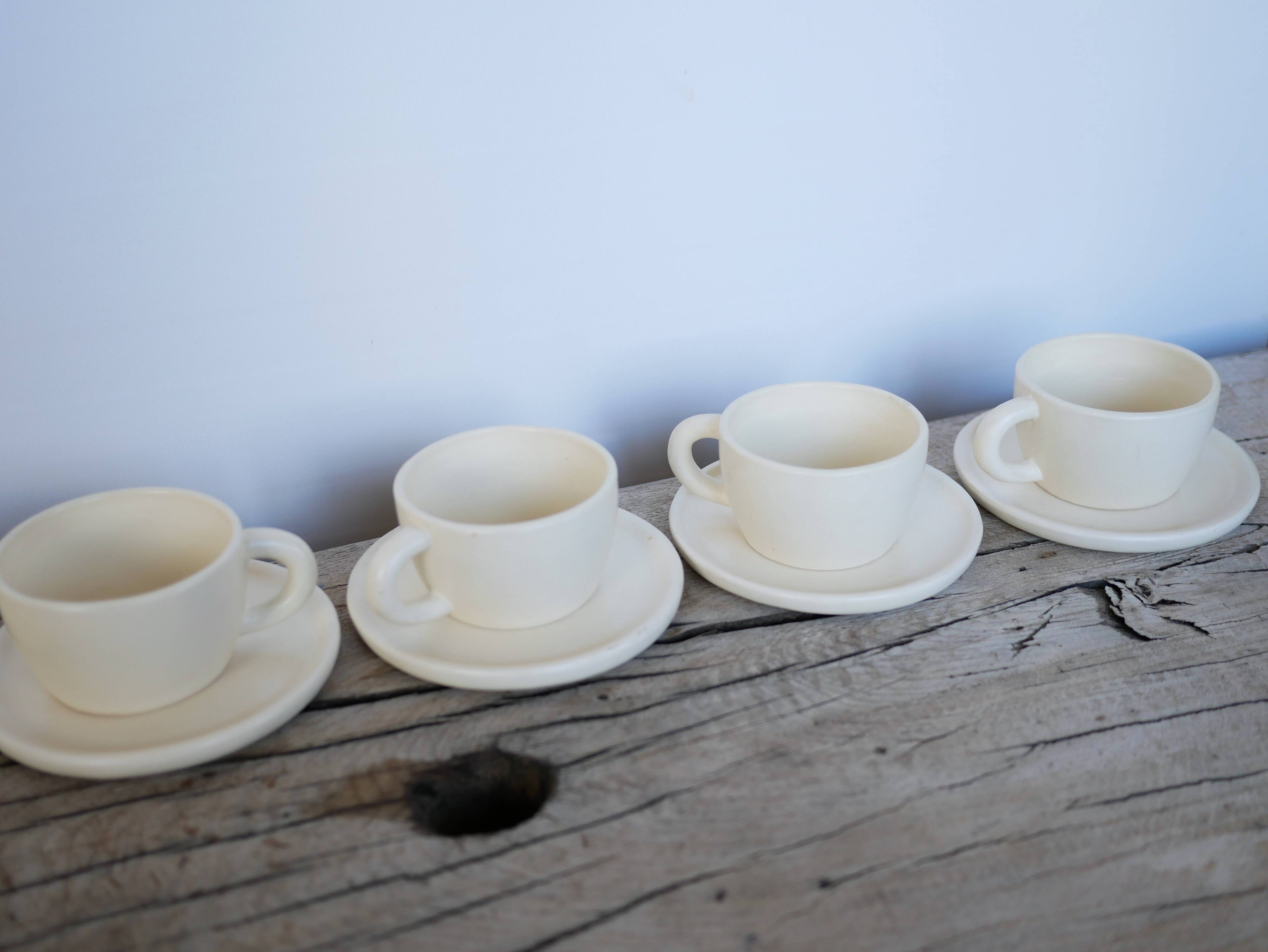 Series of 7 vintage ceramic cups and saucers by Le Pot de Terre