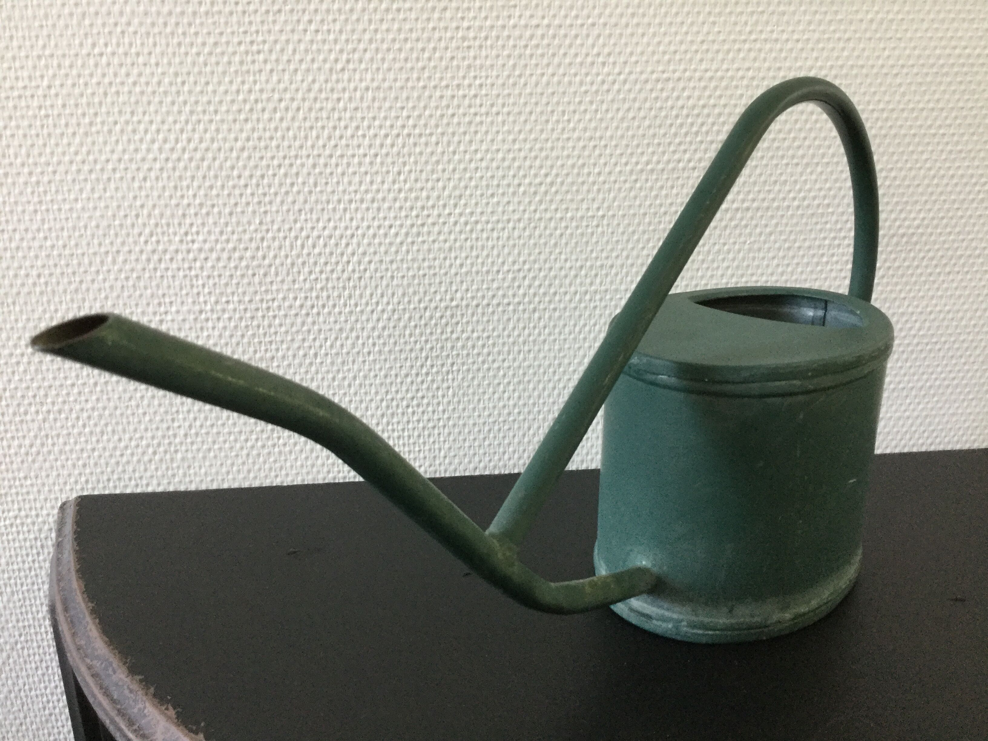 Old watering can