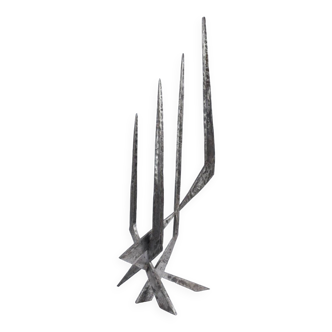 Brutalist candlestick in struck steel