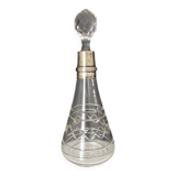 Crystal bottle with silver metal neck rim