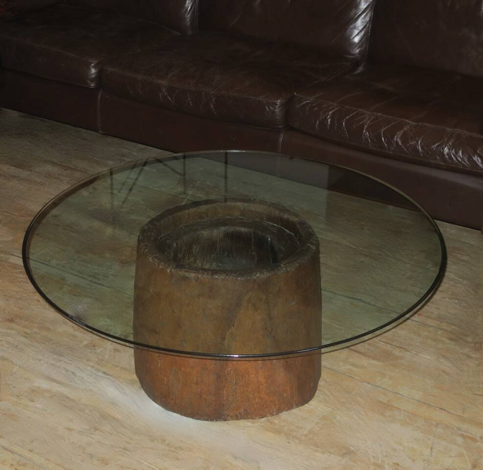 Carved antique tree stump coffee table with circular glass top
