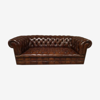 Upholstered chesterfield brown sofa