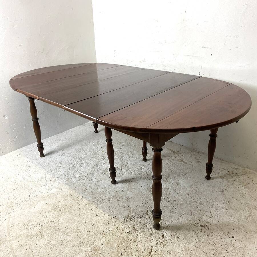 Table en acajou extensible 4 rallonges fournies