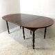 Table en acajou extensible 4 rallonges fournies