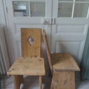 2 vintage chairs in brutalist style made of pitch pine with a waxed finish.