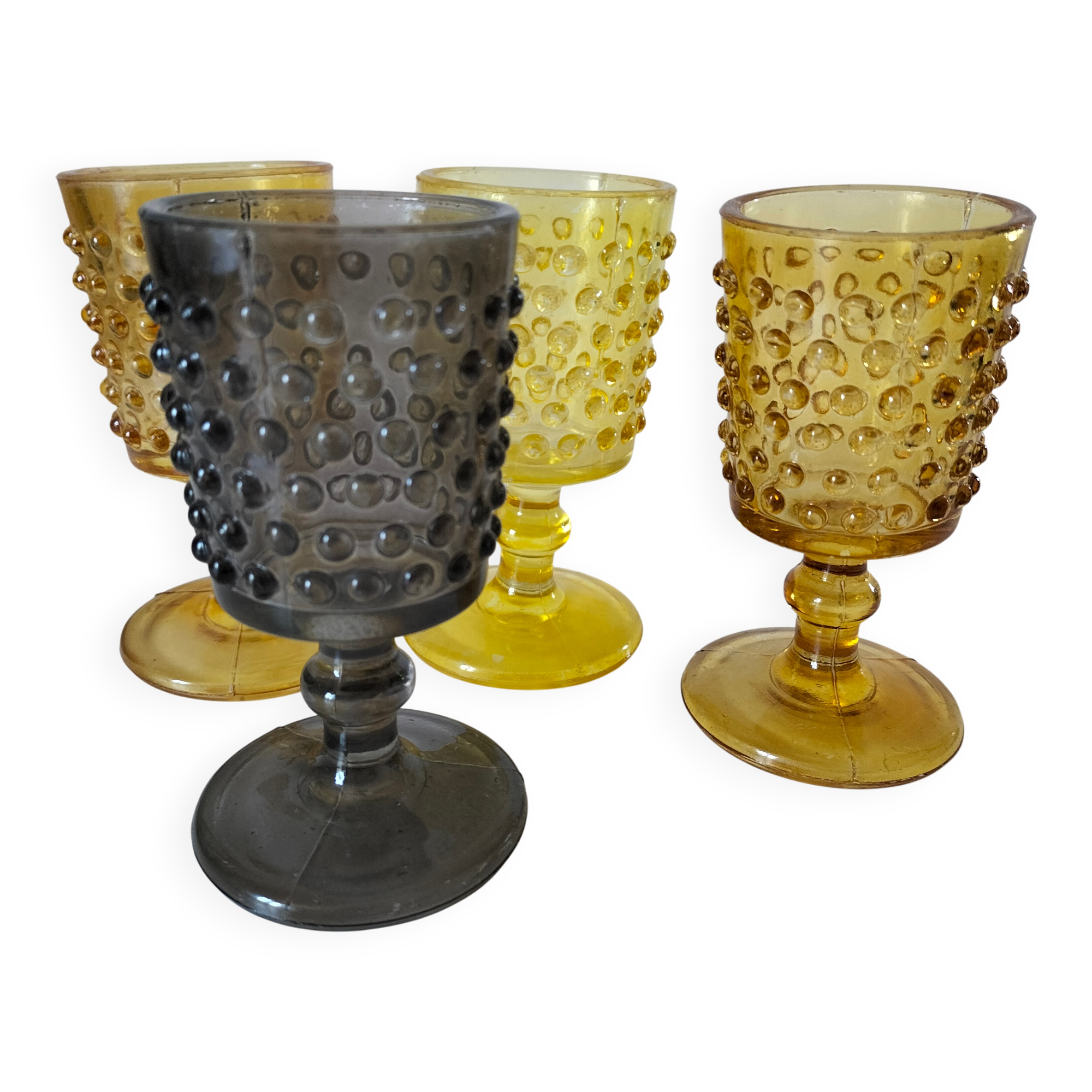 4 vintage stemmed glasses in hobnail glass and smoke colour.