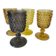 4 vintage stemmed glasses in hobnail glass and smoke colour.