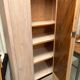Antique English wardrobe in pale pink patina.