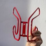Pair of red metal wall hooks