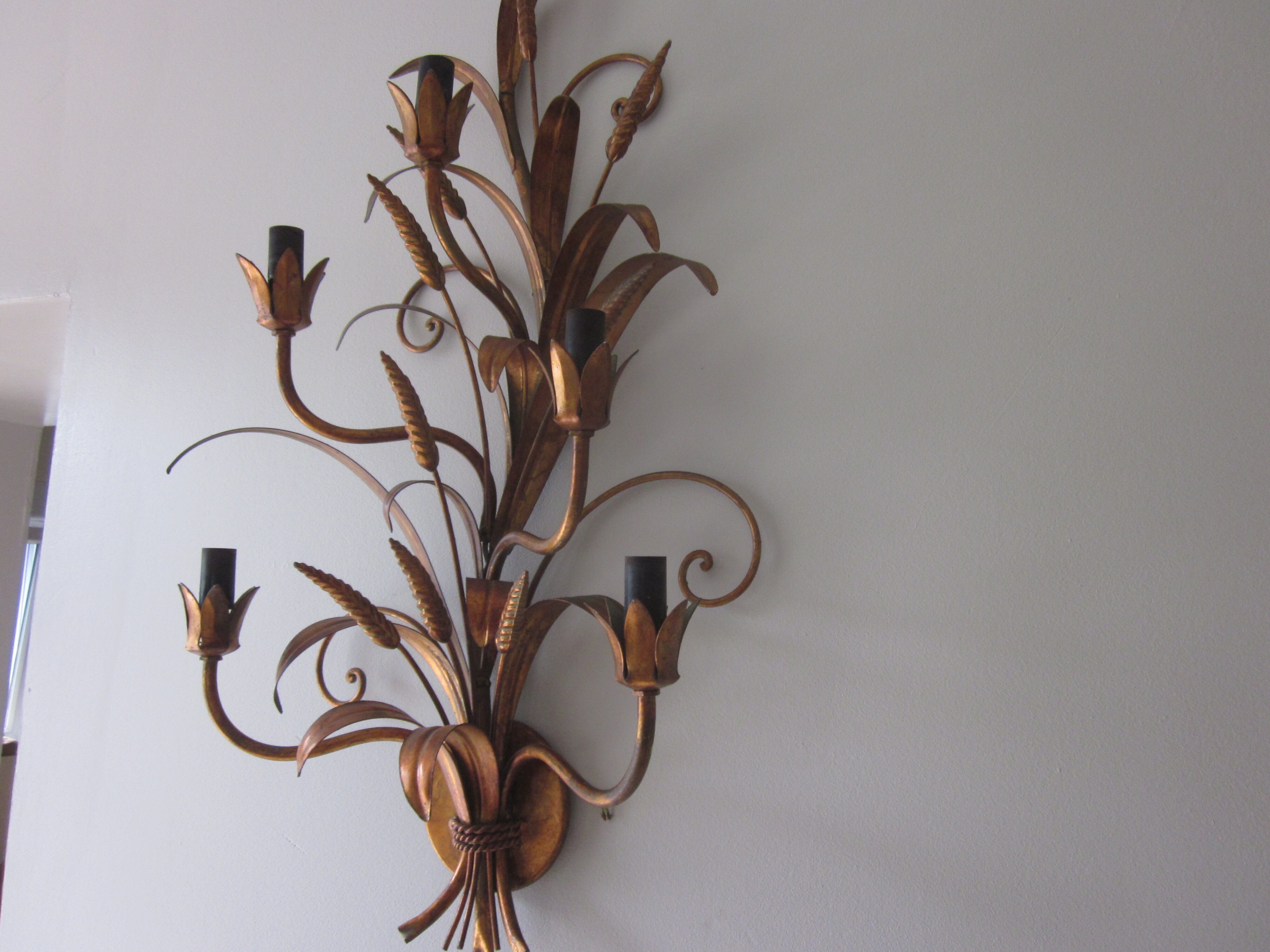 Sconce in gilded metal