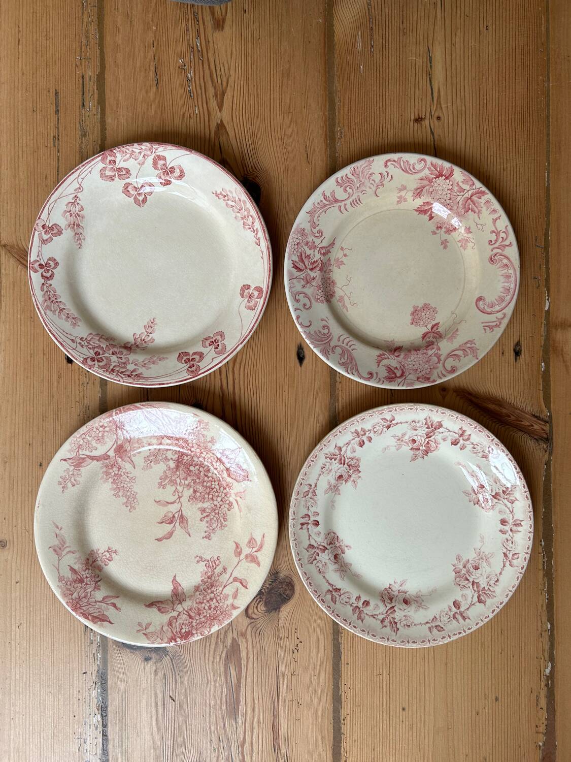 Mismatched series of 4 old “Terre de fer” flat plates
