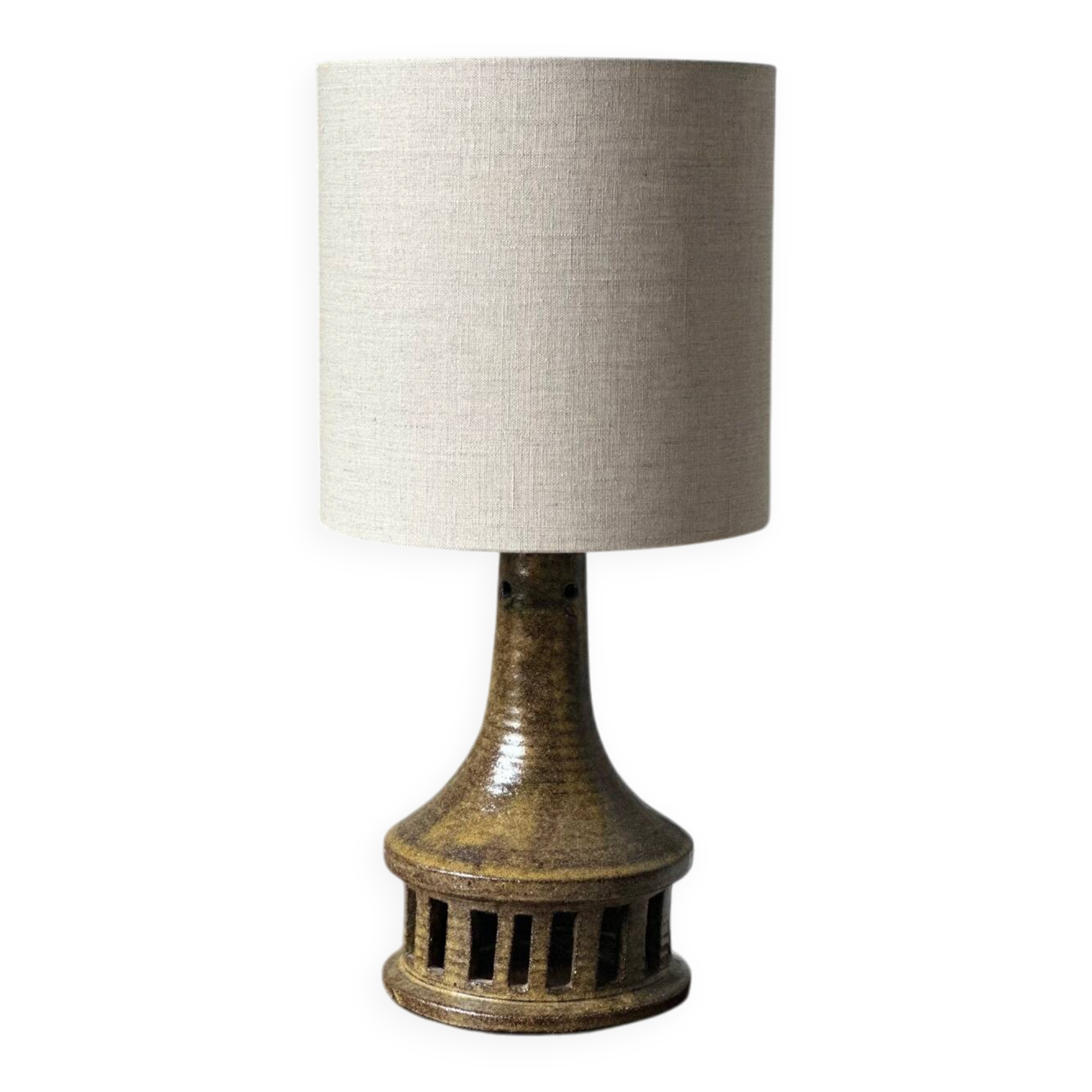 Vintage ceramic table lamp with integrated light base.