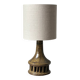 Vintage ceramic table lamp with integrated light base.