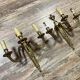 Pair of Louis XVI style gilt bronze wall lights with two light arms, 20th century