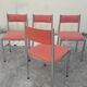 Set of 4 vintage chrome and orange faux leather chairs.