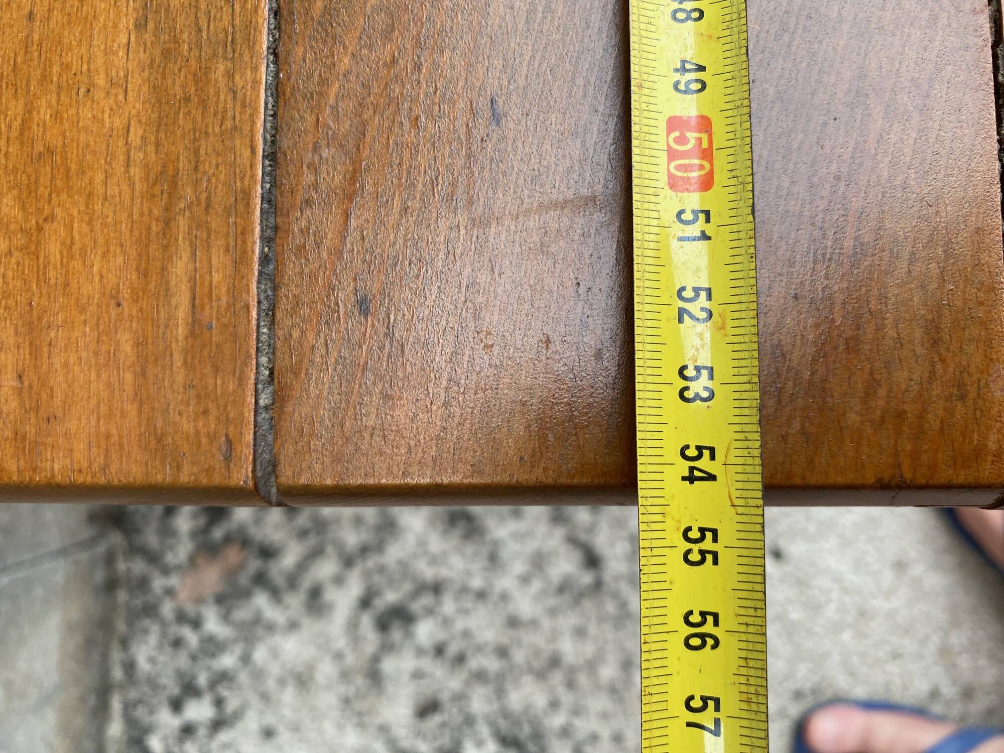 Small side table or bistro serving table with curved wood.