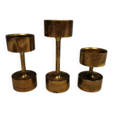Three beautiful candle holders in solid brass, for block candles.