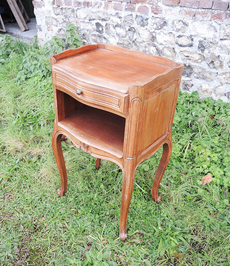 Old wooden bedside table Louis XV style