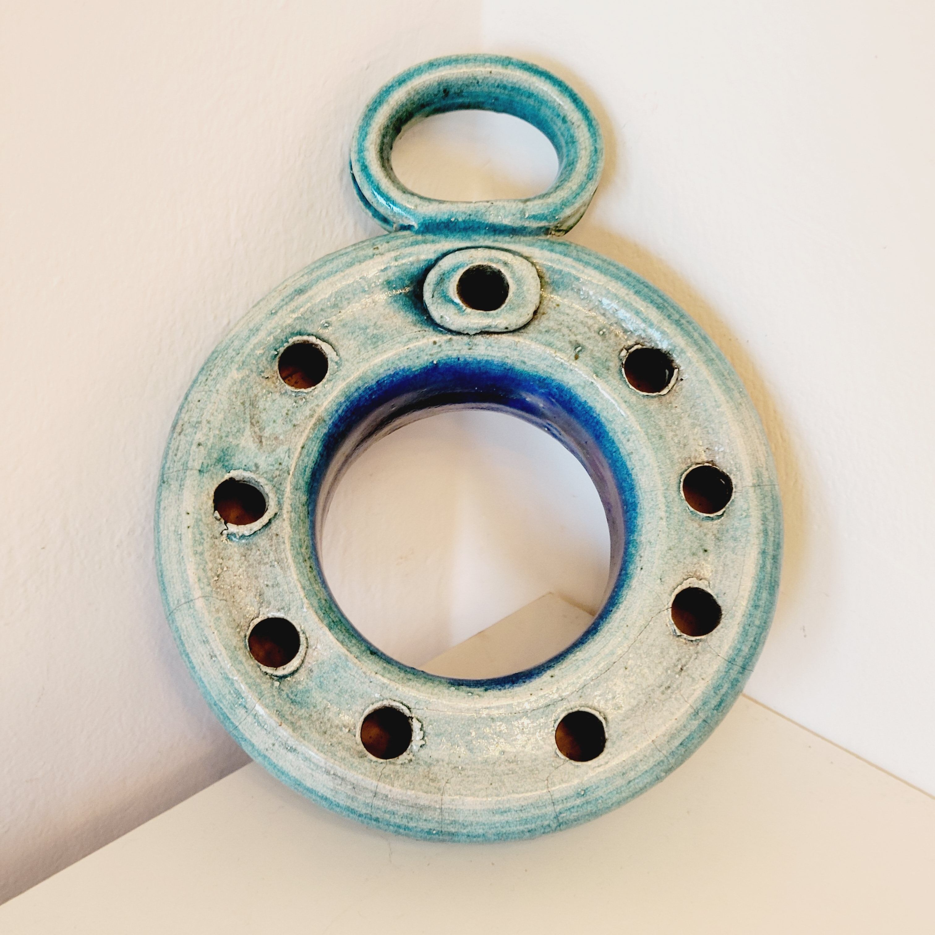 Pique flowers or pikes blue ceramic candles